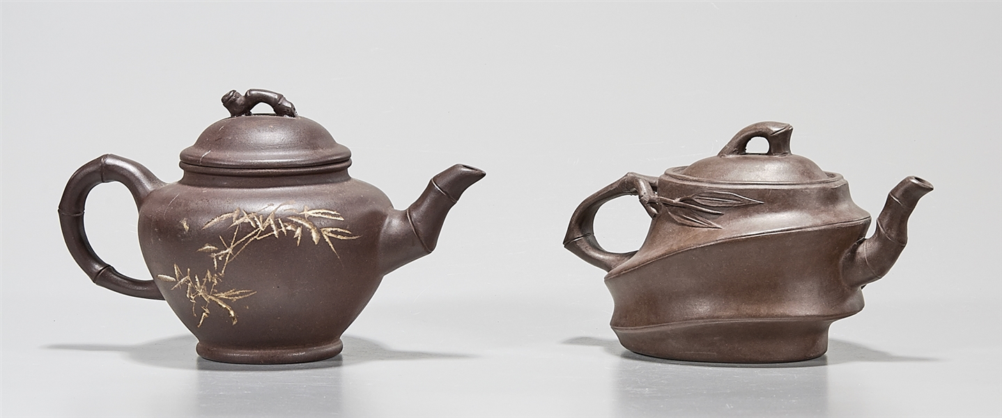 Appraisal: Two Chinese Yixing pottery tea pots each with mark x