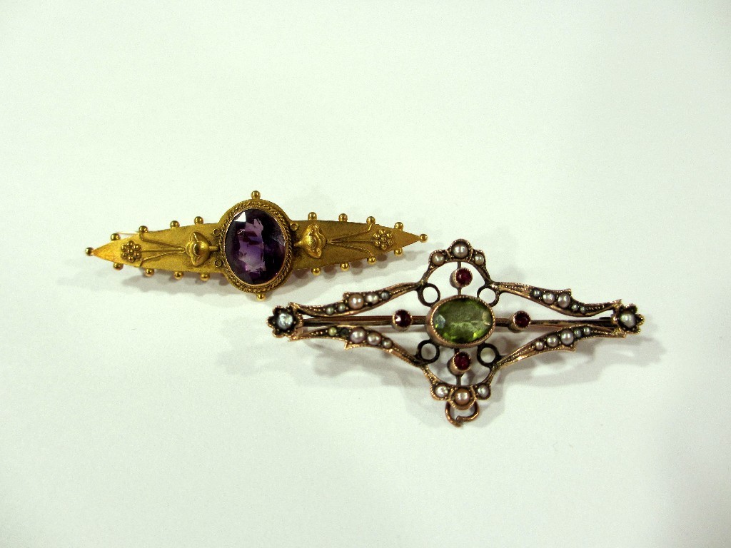 Appraisal: A Victorian ct gold gem set scroll brooch set with