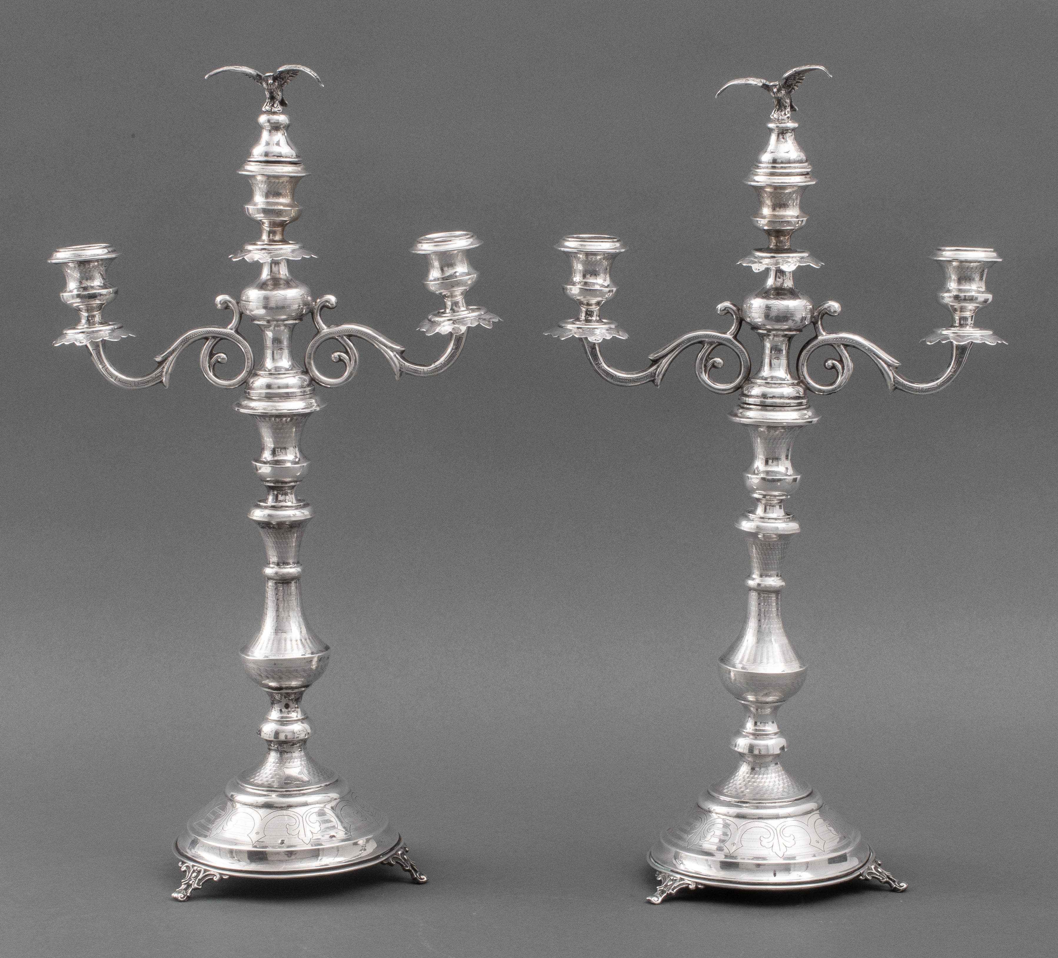 Appraisal: AUSTRIAN SILVER EAGLE FINIAL CANDELABRA PAIR Pair of Austrian silver