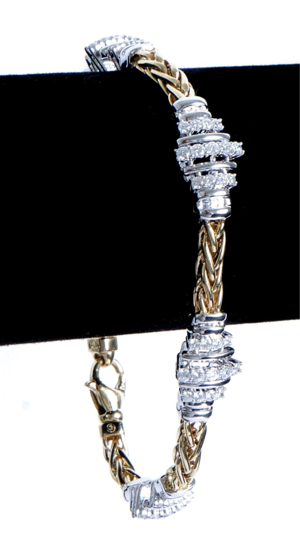 Appraisal: K WHITE YELLOW GOLD BRACELET W DIAMONDS k white and