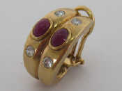 Appraisal: A yellow metal tests as carat gold cabochon ruby and