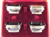 Appraisal: A set of four silver salts with cranberry glass liners