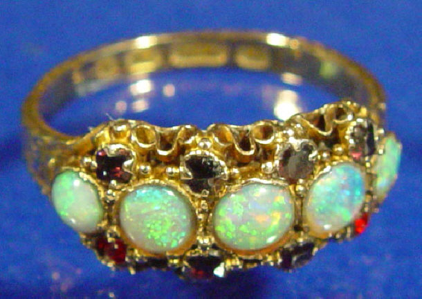 Appraisal: ct gold opal and ruby ring