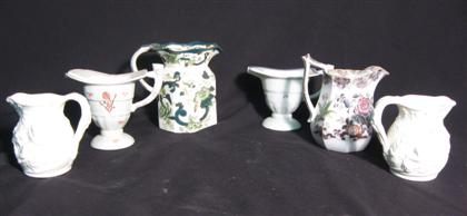 Appraisal: Group of twelve assorted ceramic pitchers and Royal Doulton dessert