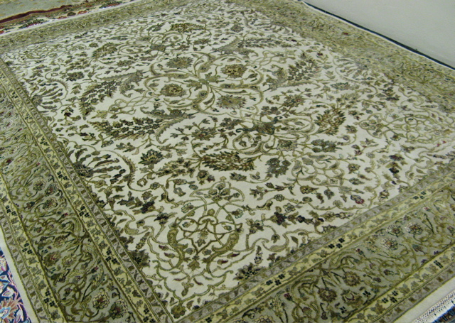 Appraisal: PAKISTANI-PERSIAN SILK AND WOOL CARPET ' x '