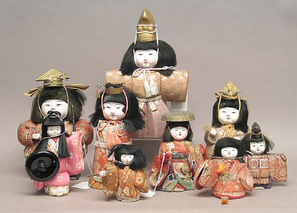 Appraisal: Nine Japanese dolls th th Century Each with a stiff