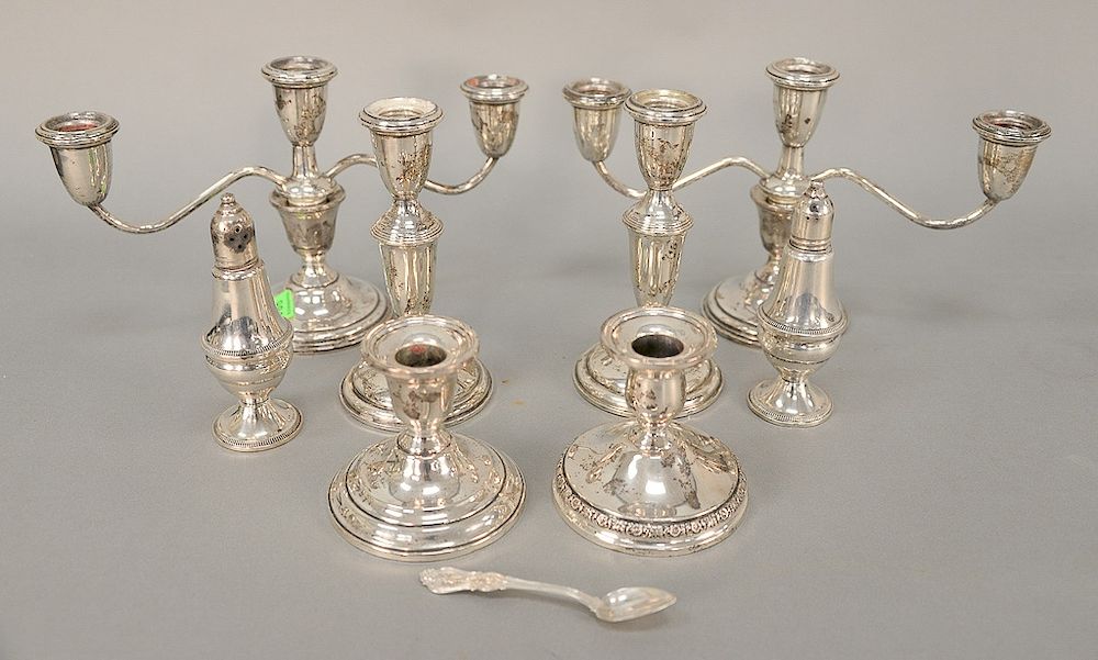 Appraisal: Sterling silver lot of weighted candelabra and candlesticks Provenance From