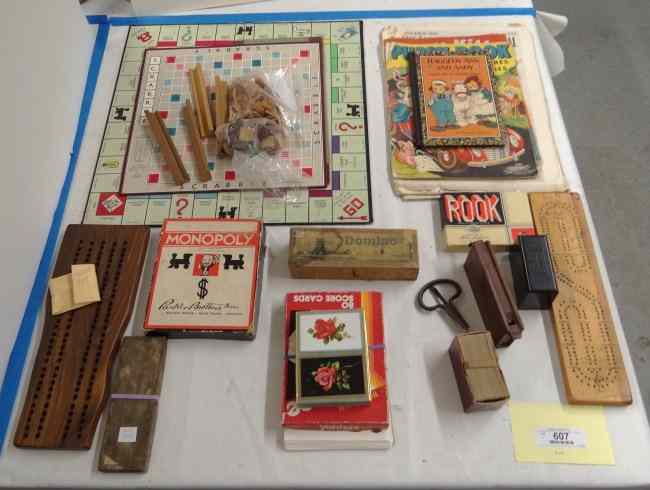 Appraisal: Lot misc early board games cribbage boards Dominoes Monopoly children's