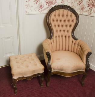 Appraisal: Victorian Walnut Chair and Footstool Carved Walnut with Grapes Chair