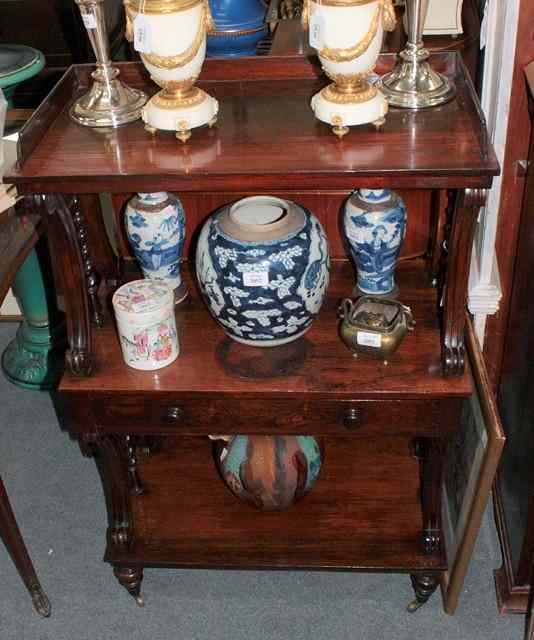 Appraisal: AN EARLY VICTORIAN ROSEWOOD THREE TIER WHATNOT each tier with