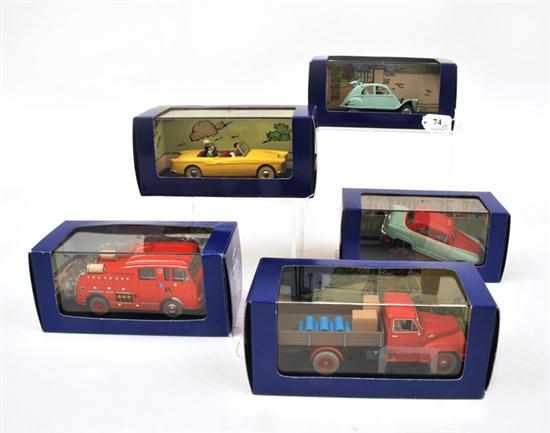 Appraisal: FIVE EN VOITURE TINTIN FIGURES FROM TINTIN COMICS INCLUDING X