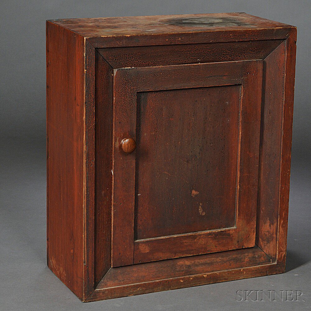 Appraisal: Red-painted Cupboard New England early th century the dovetail-constructed case