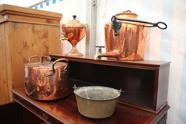 Appraisal: A VICTORIAN COPPER KETTLE with iron looping handle and tap