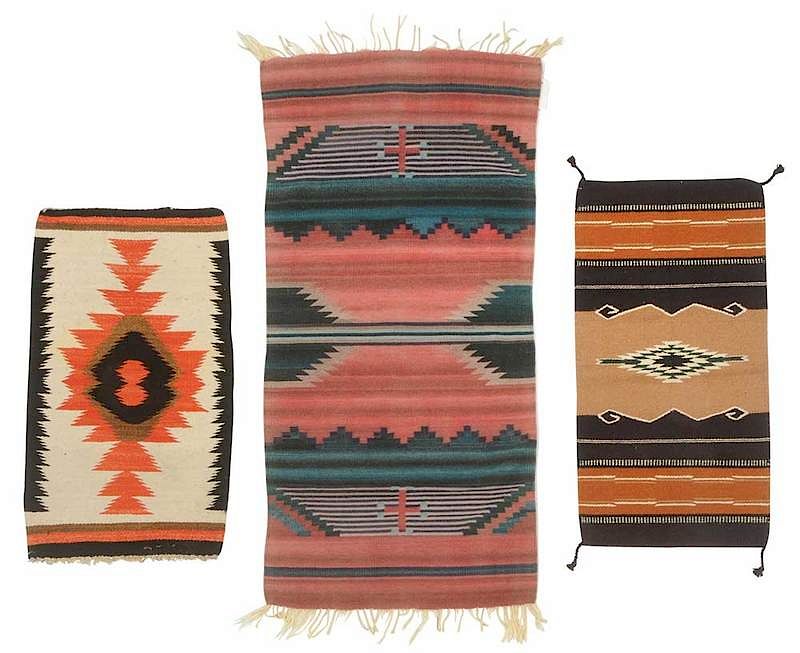 Appraisal: Three Southwestern Saddle Blanket Style Weavings th century child's saddle