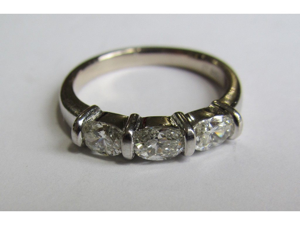 Appraisal: An eighteen carat white gold diamond three stone ring with