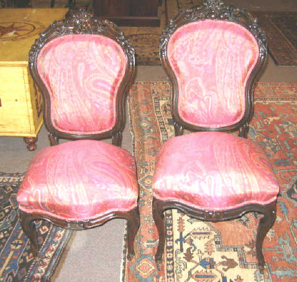 Appraisal: PAIR AMERICAN ROCOCO REVIVAL ROSEWOOD SIDE CHAIRS The shield form