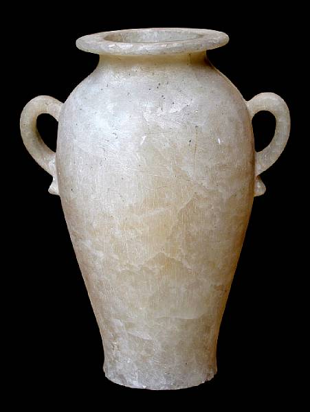 Appraisal: An Egyptian white alabaster two handled urn th th century