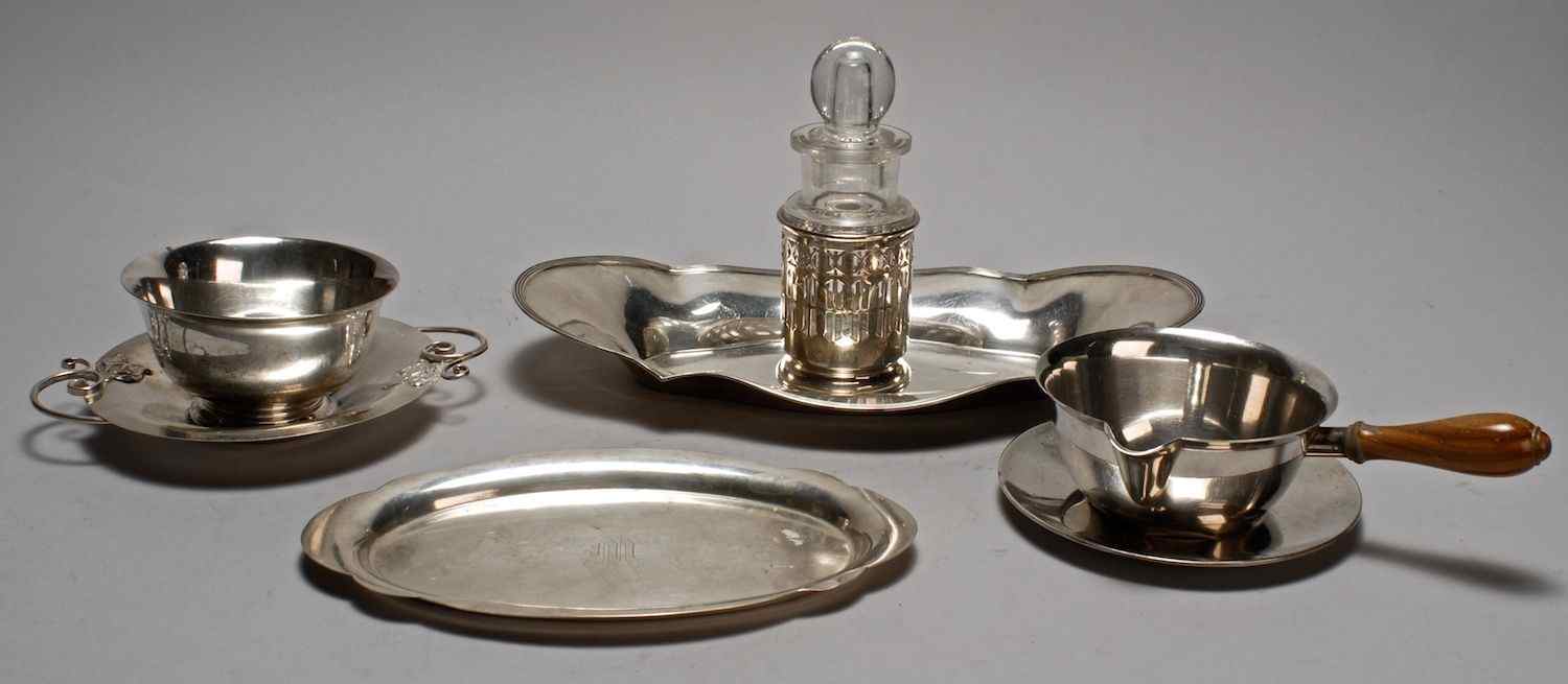 Appraisal: SEVEN PIECES OF STERLING SILVER HOLLOWWAREIncludes a Tiffany sauceboat and