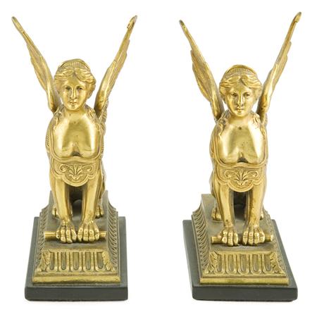 Appraisal: Companion Pair of Empire Style Gilt-Bronze Garniture Decorations Estimate -