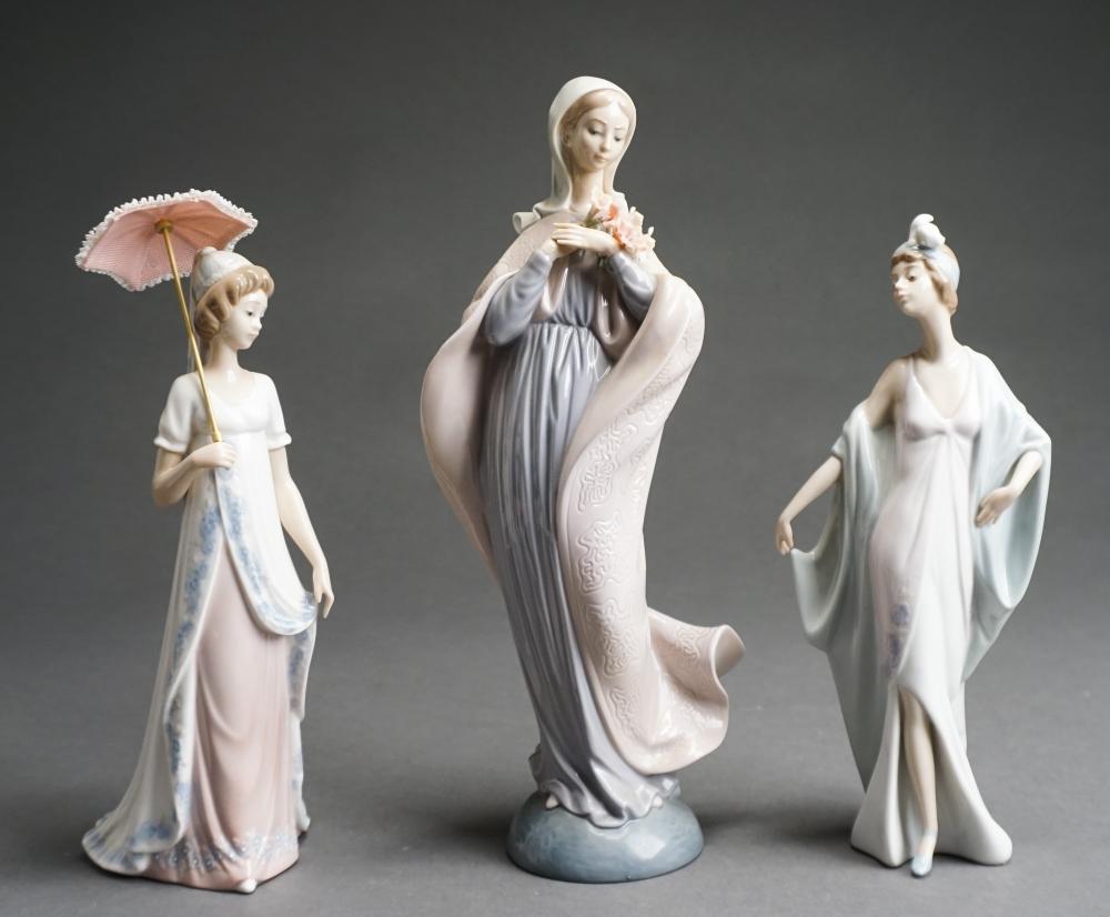 Appraisal: THREE LLADRO PORCELAIN FIGURES OF WOMEN H OF TALLEST IN