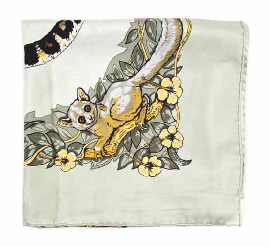 Appraisal: An Hermes Silk Scarf in a 'Jungle Love' motif Labeled