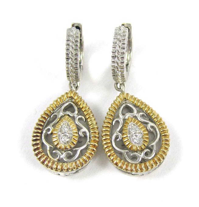 Appraisal: PAIR OF DIAMOND SILVER AND YELLOW GOLD EARRINGS each silver