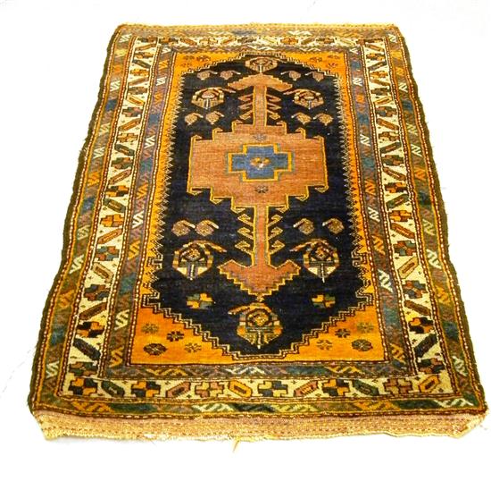 Appraisal: Antique Persian scatter rug geometric design blue in brown medallion