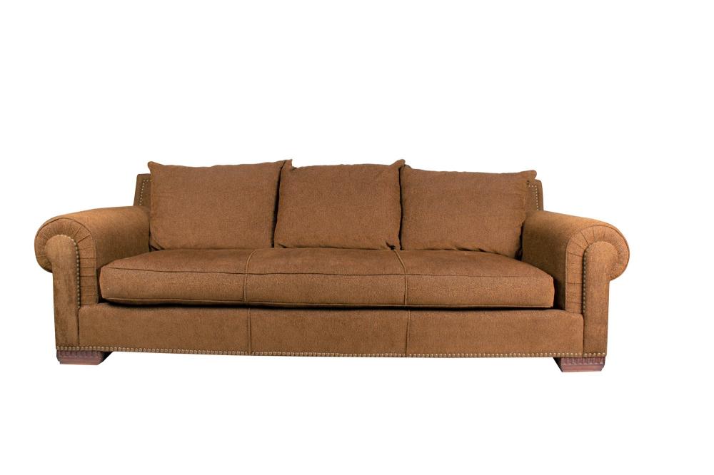 Appraisal: MARGE CARSON UPHOLSTERED SOFAwith brown variegated weave upholstery with metal