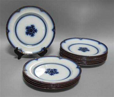 Appraisal: TWELVE FLOW BLUE DINNER PLATES Late th century pattern no