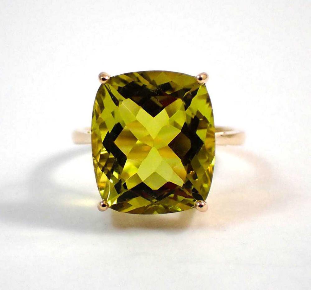 Appraisal: LEMON QUARTZ AND FOURTEEN KARAT GOLD RING with four yellow