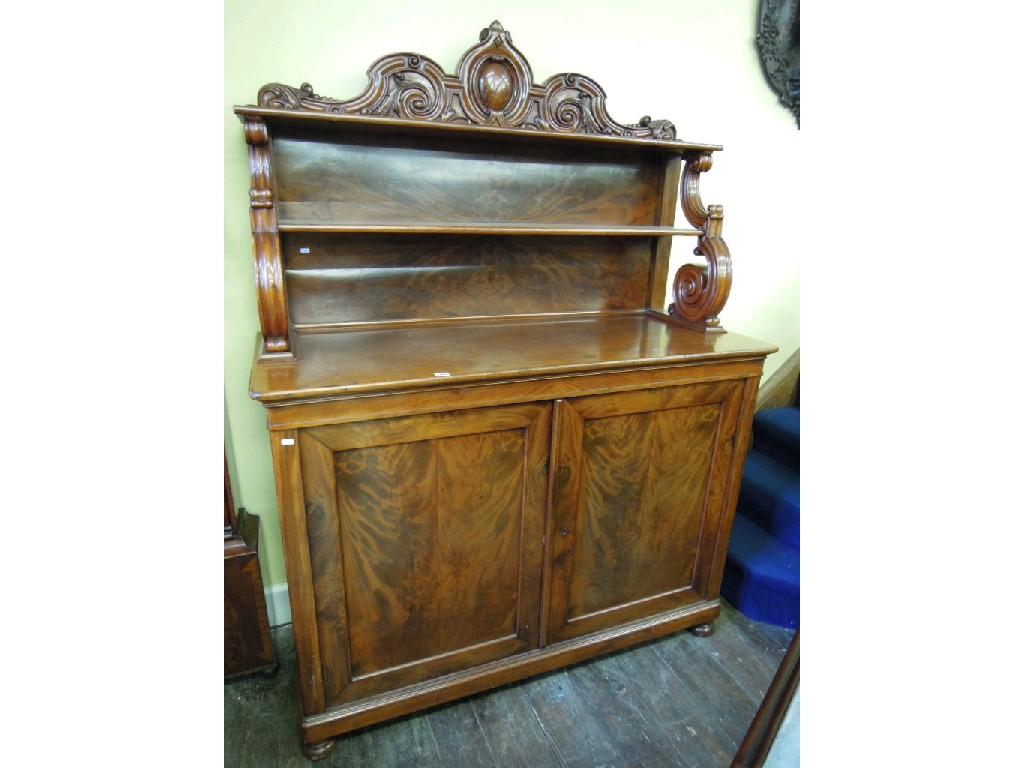 Appraisal: A large th century mahogany chiffonier with well matched flame