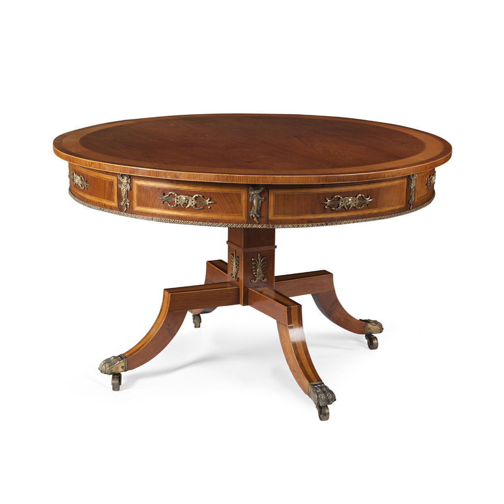 Appraisal: REGENCY ROSEWOOD AND SATINWOOD DRUM LIBRARY TABLE IN THE MANNER