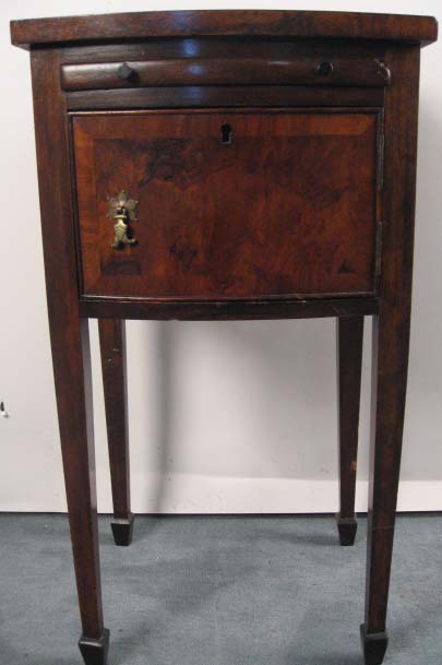 Appraisal: A th C Walnut Single-door Stand with curved front and