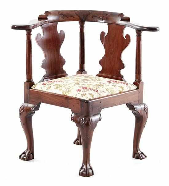 Appraisal: George III carved mahogany corner chair circa shaped crestrail with