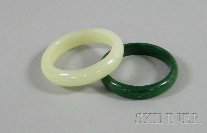 Appraisal: Two Asian Stone Bangles white and green