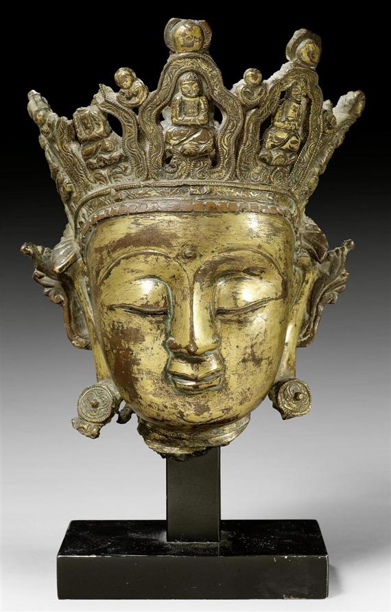 Appraisal: A FINE GILT BRONZE HEAD OF GUANYIN China Ming dynasty