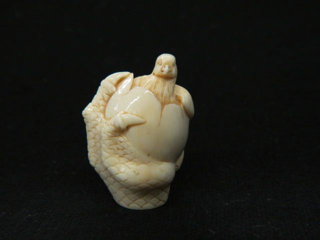 Appraisal: Carved Ivory Netsuke of a Chickemerging from an egg chicken