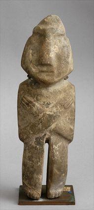 Appraisal: MEZCALA FIGURE Standing stone figure with arms crossed of simple