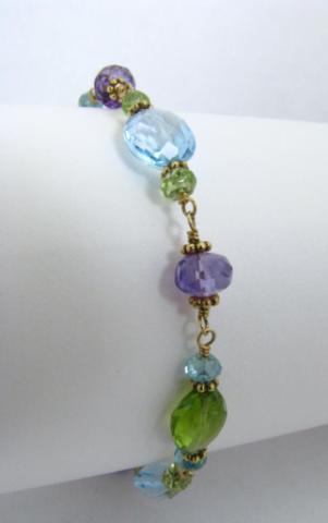 Appraisal: New k yellow gold amethyst blue topaz peridot apatite stone