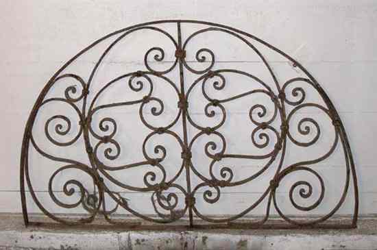 Appraisal: A Wrought Iron Arched Transom Grill circa having scrolling design