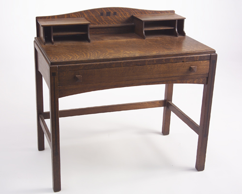 Appraisal: LIMBERT Ebon-Oak writing desk with arched backsplash gallery top and