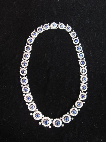 Appraisal: A SAPPHIRE AND DIAMOND NECKLACE each graduated link forming a