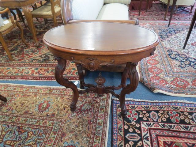 Appraisal: th Century Carved Oval Top Table with stretcher and finial