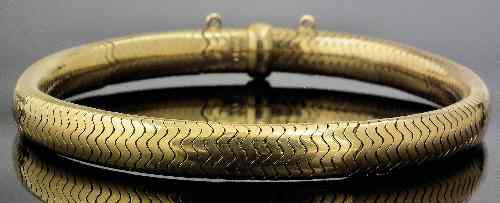 Appraisal: A German ct gold articulated bracelet mm overall gross weight