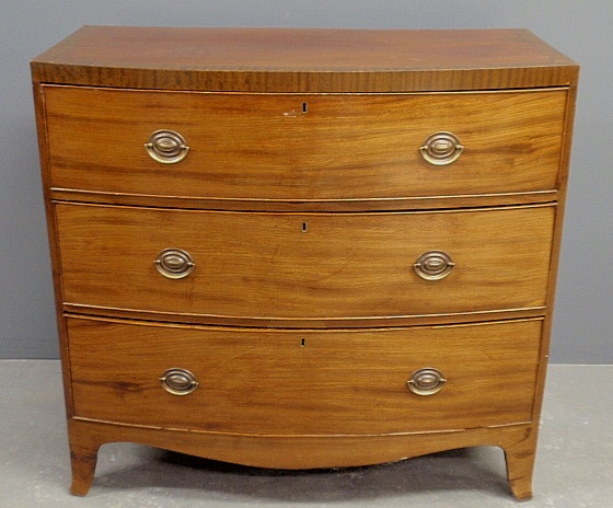 Appraisal: - Georgian mahogany bow-front chest of drawers c with flaring