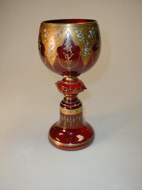 Appraisal: A late thC Bohemian enamelled ruby glass goblet high