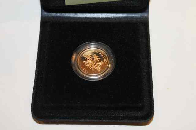 Appraisal: A GUERNSEY GOLD ONE POUND PROOF COIN dated with original