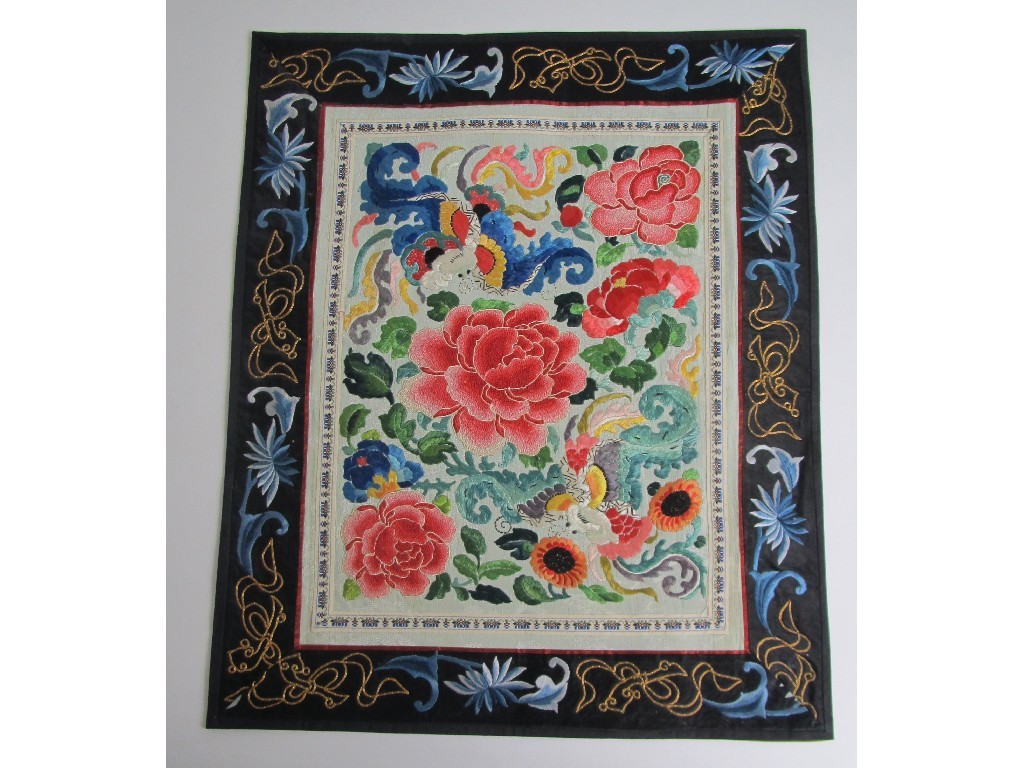 Appraisal: A rectangular panel embroidered in silks with bat amongst peonies