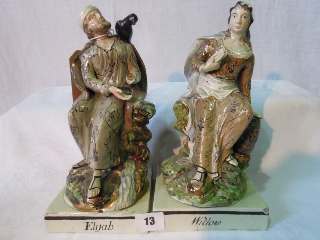 Appraisal: A pair of early th century Staffordshire figures of Elijah