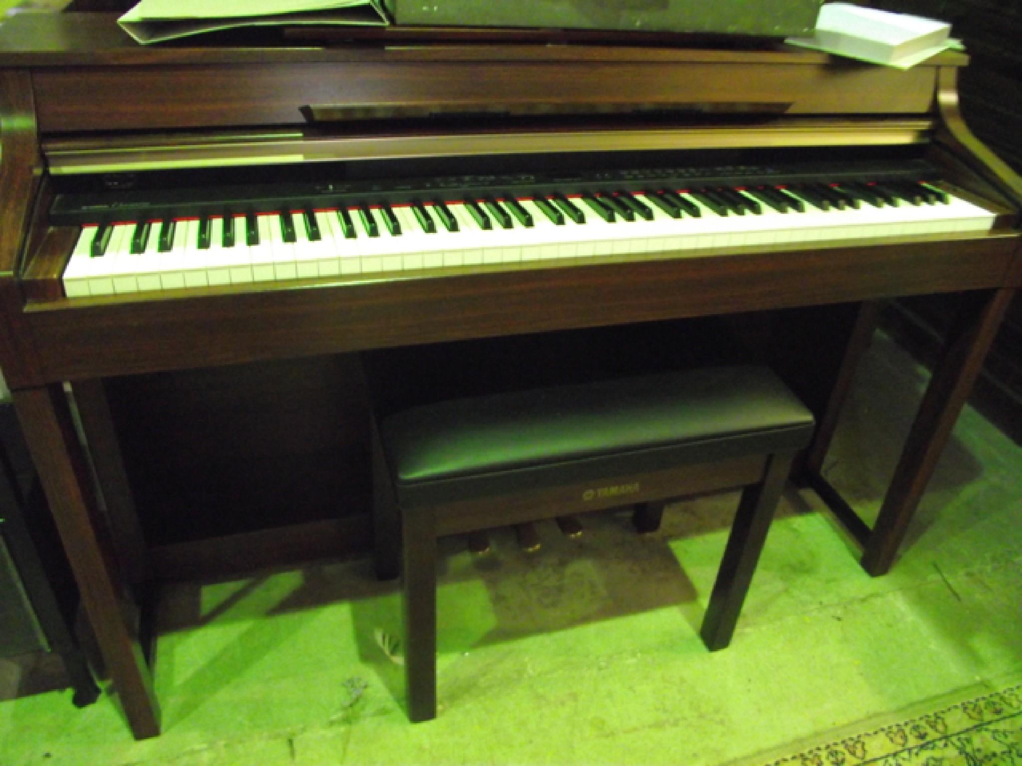 Appraisal: A contemporary Yamaha Clavinova electric piano and matching stool